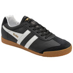 Black Gola Harrier trainer with white stripes and a gum sole