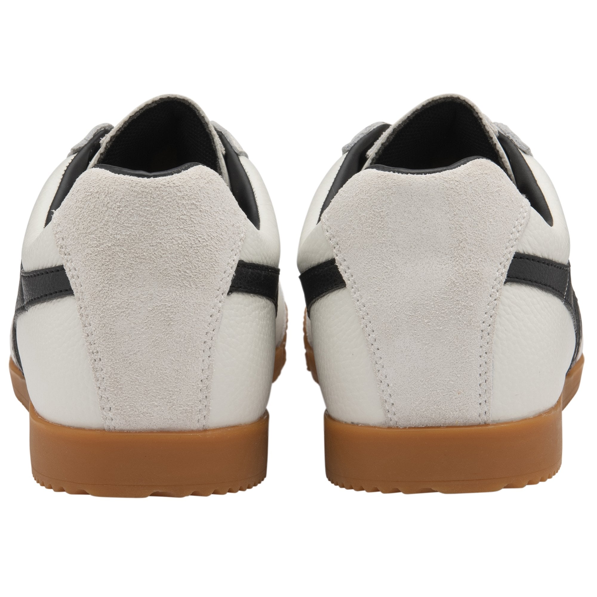 Pair of white sneakers with black stripes and gum soles, rear view