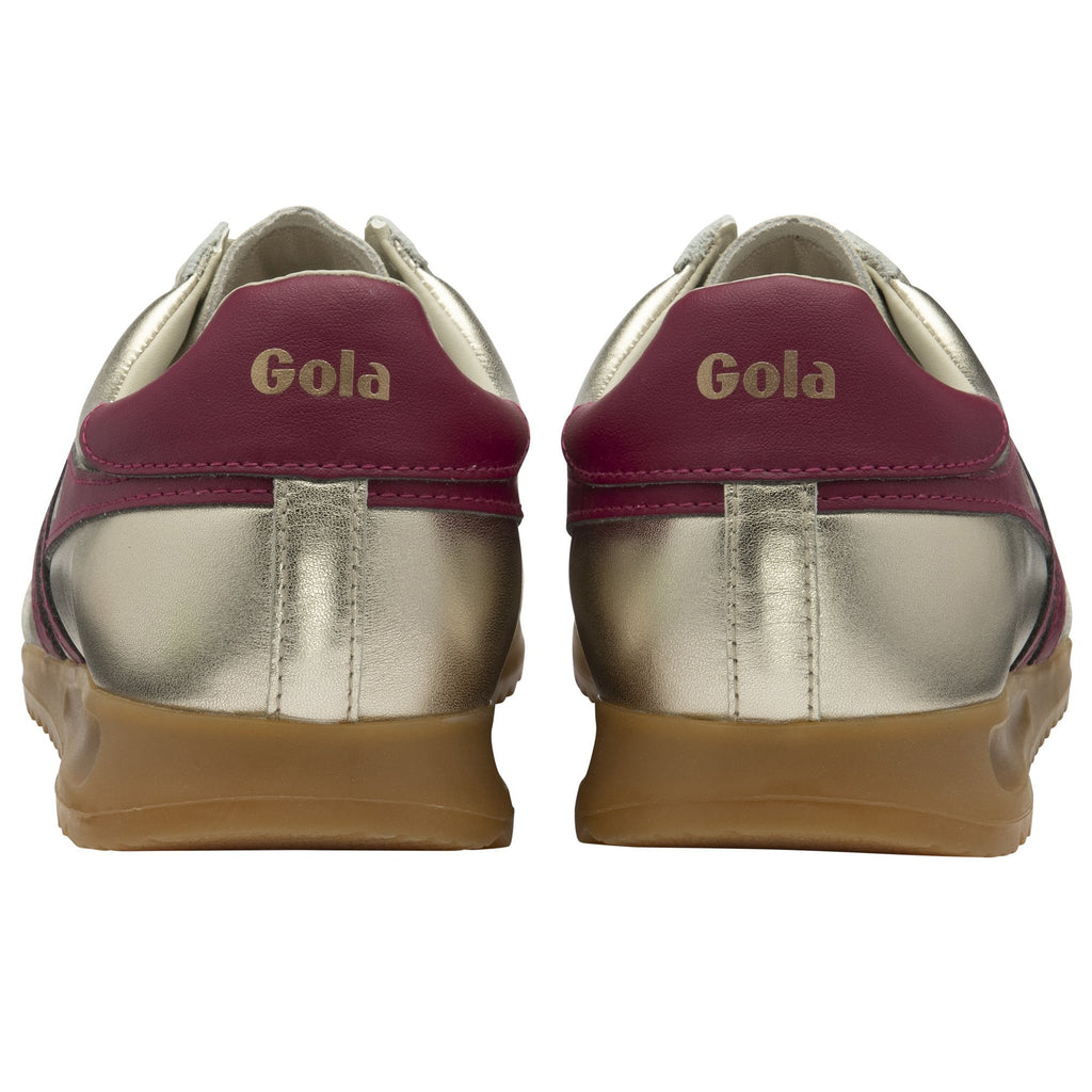 Rear view of two gold and burgundy Gola sneakers with gum soles