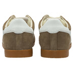Pair of brown suede sneakers with white leather heel tabs and gum soles, rear view