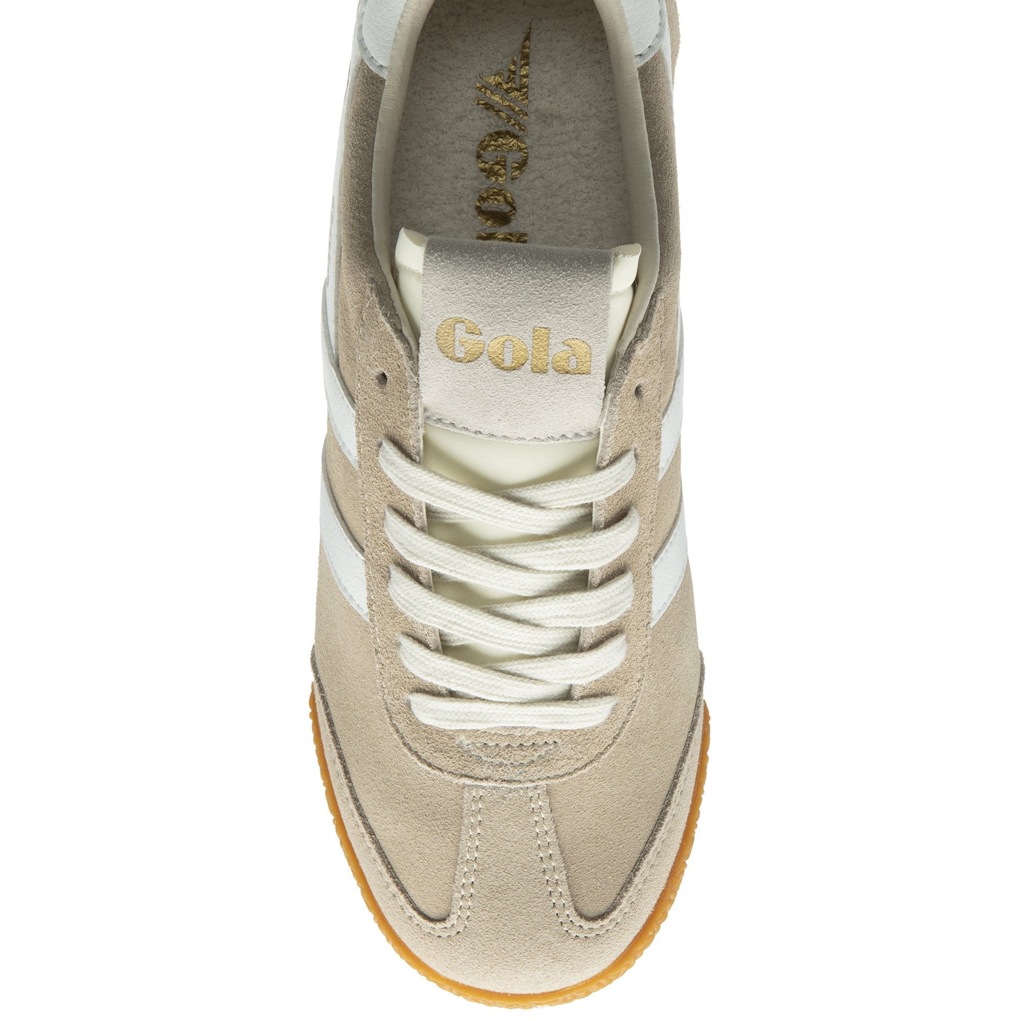 Top-down view of a single Gola Harrier trainer in off-white with white stripes.