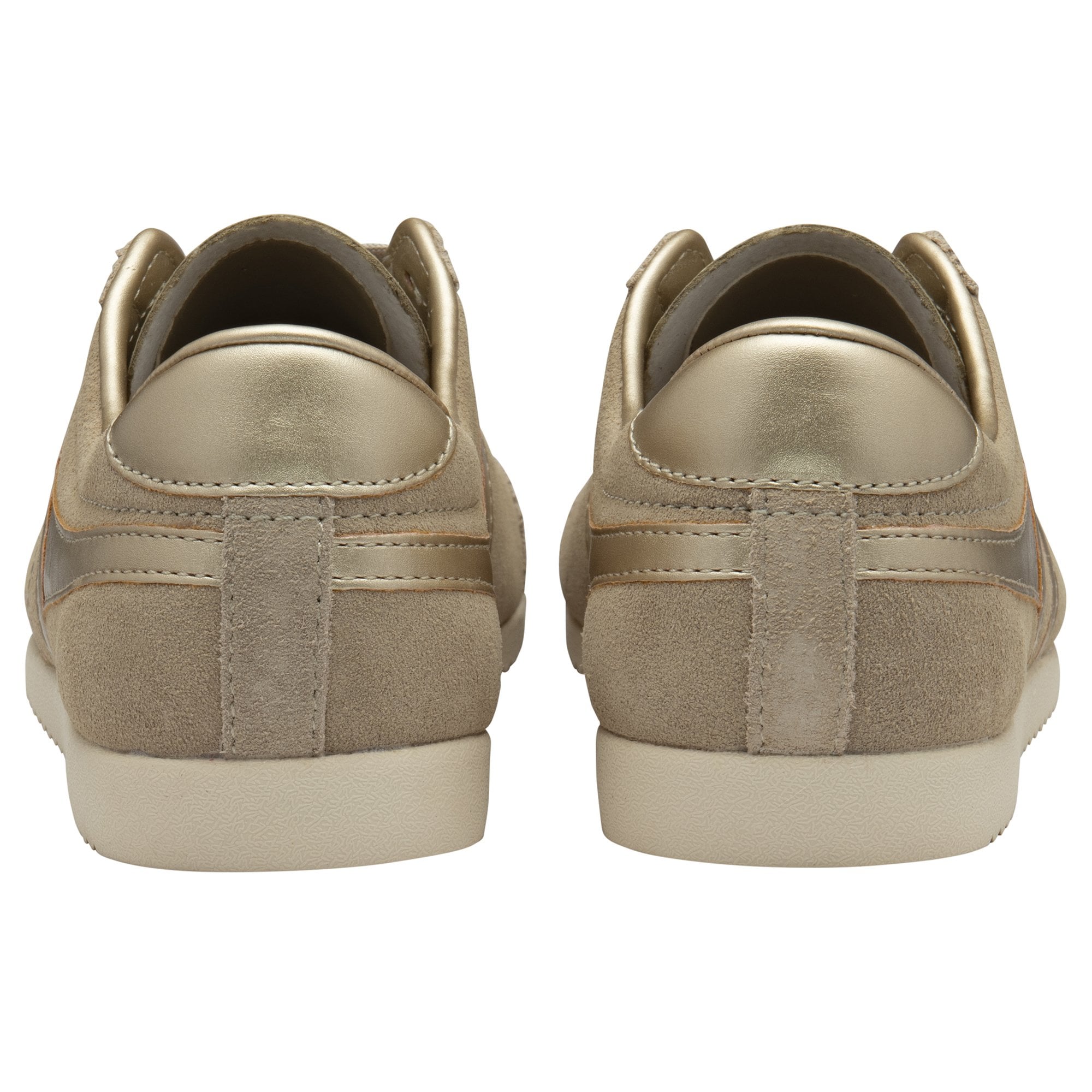 The rear view of a pair of Gola Hurricane trainers in light brown with gold heels.
