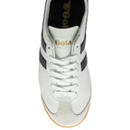 A top-down view of a white and black Gola Bullet sneaker.