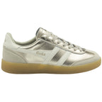 A shiny gold Gola sneaker with white stripes and a brown sole, facing right.