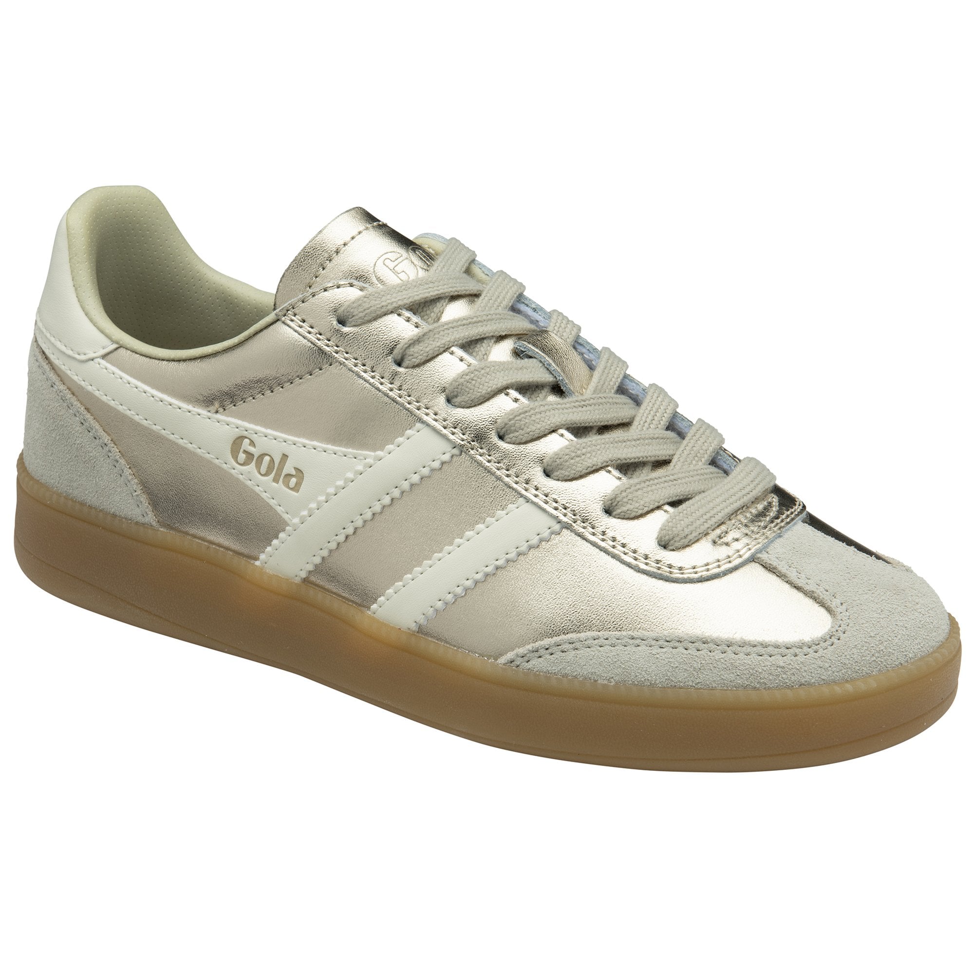 A slightly angled view of a gold Gola sneaker with white stripes and a brown sole.