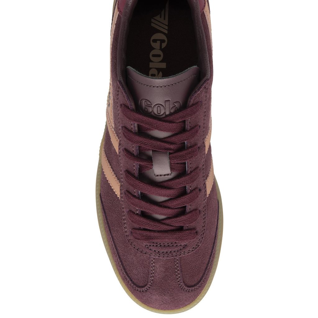 The top-down view of a single burgundy Gola sneaker with tan stripes and laces.