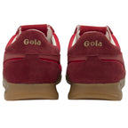 The back view of a pair of red Gola sneakers, showing the Gola logo on the heel.