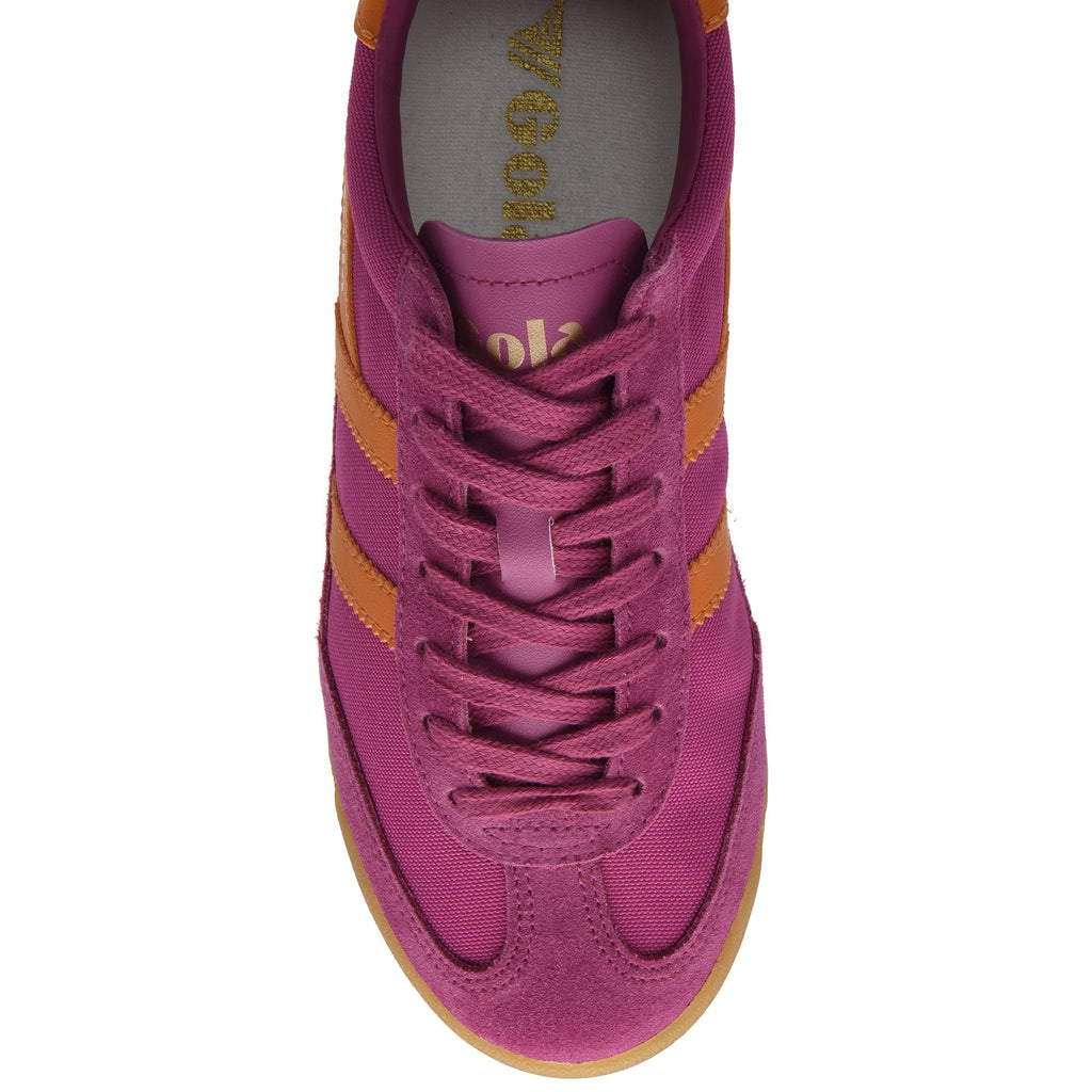 Top down view of a fuchsia trainer with orange stripes and laces