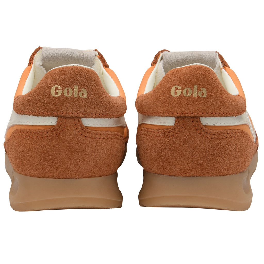 Rear view of two Gola sneakers in orange and brown suede with white accents and gum soles.