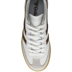Top-down view of a white Gola sneaker with brown stripes and a gum sole.