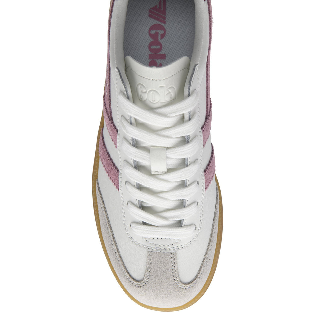 Top-down view of a white Gola sneaker with pink stripes and white laces.