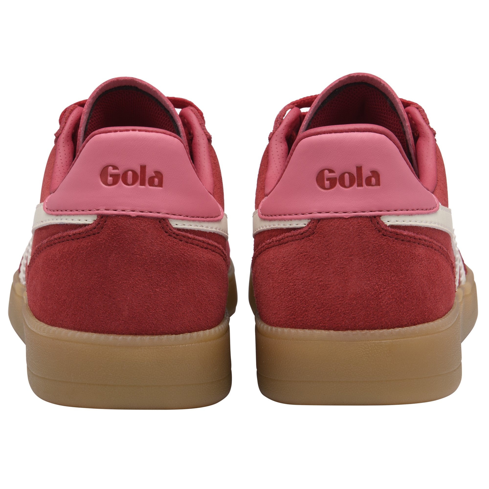 Rear view of two red suede Gola sneakers with pink heel tabs and gum soles.