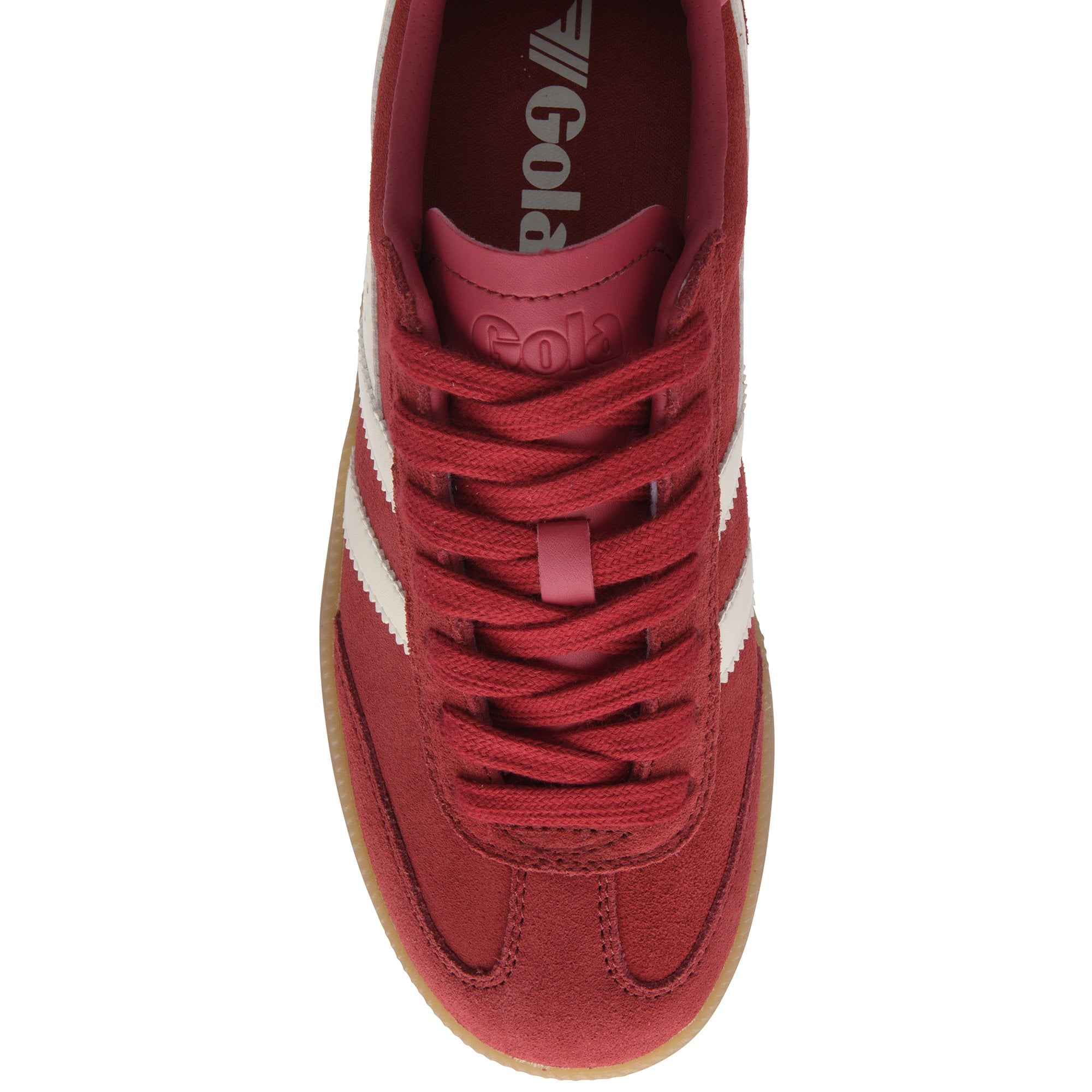 Top down view of a red suede Gola trainer with white stripes and a gum sole
