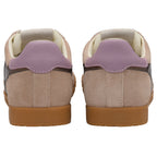 Rear view of two beige suede sneakers with purple heel tabs and brown rubber soles.