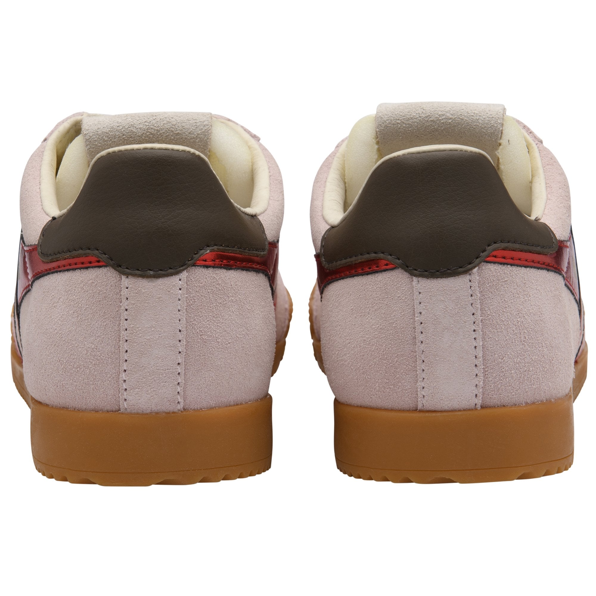 Back view of two light pink suede sneakers with brown heels and gum soles.