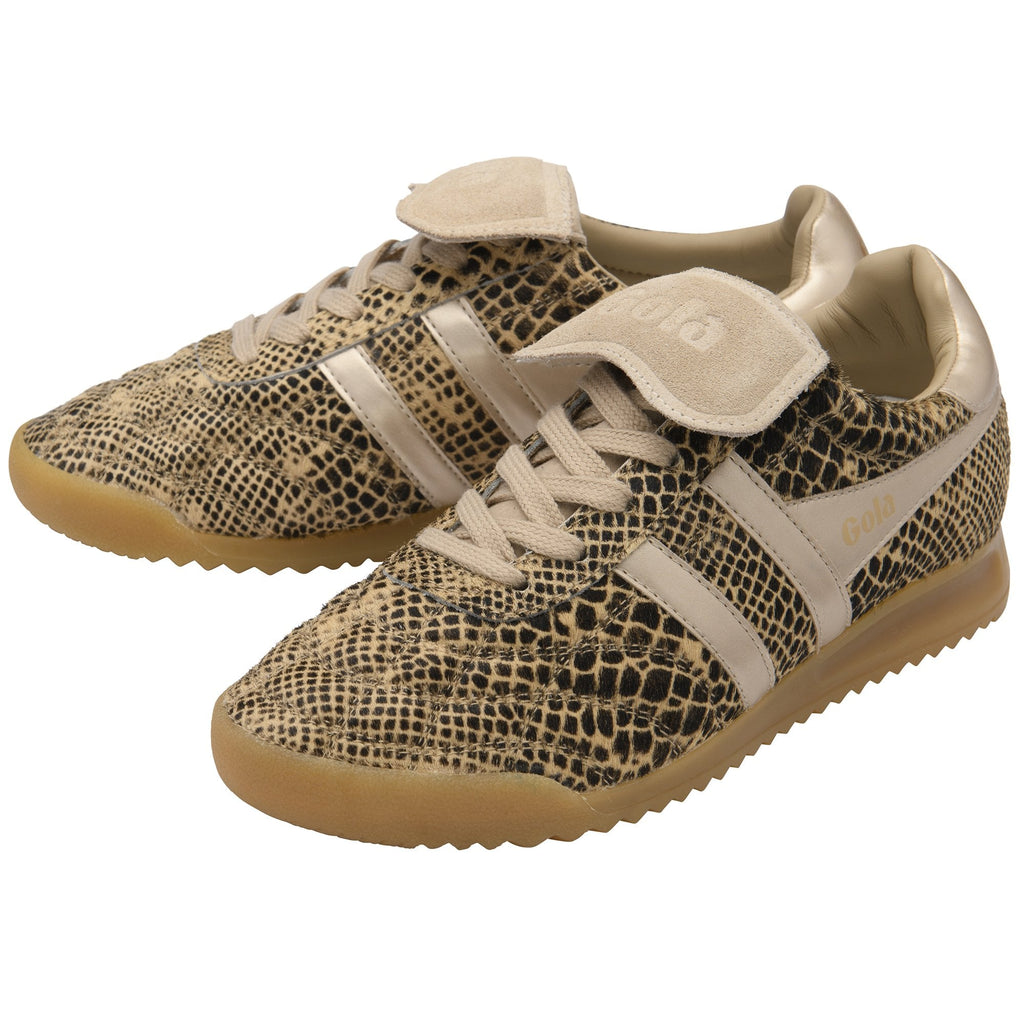 Pair of Gola sneakers with a beige and black snakeskin pattern, white stripes, and tan soles.