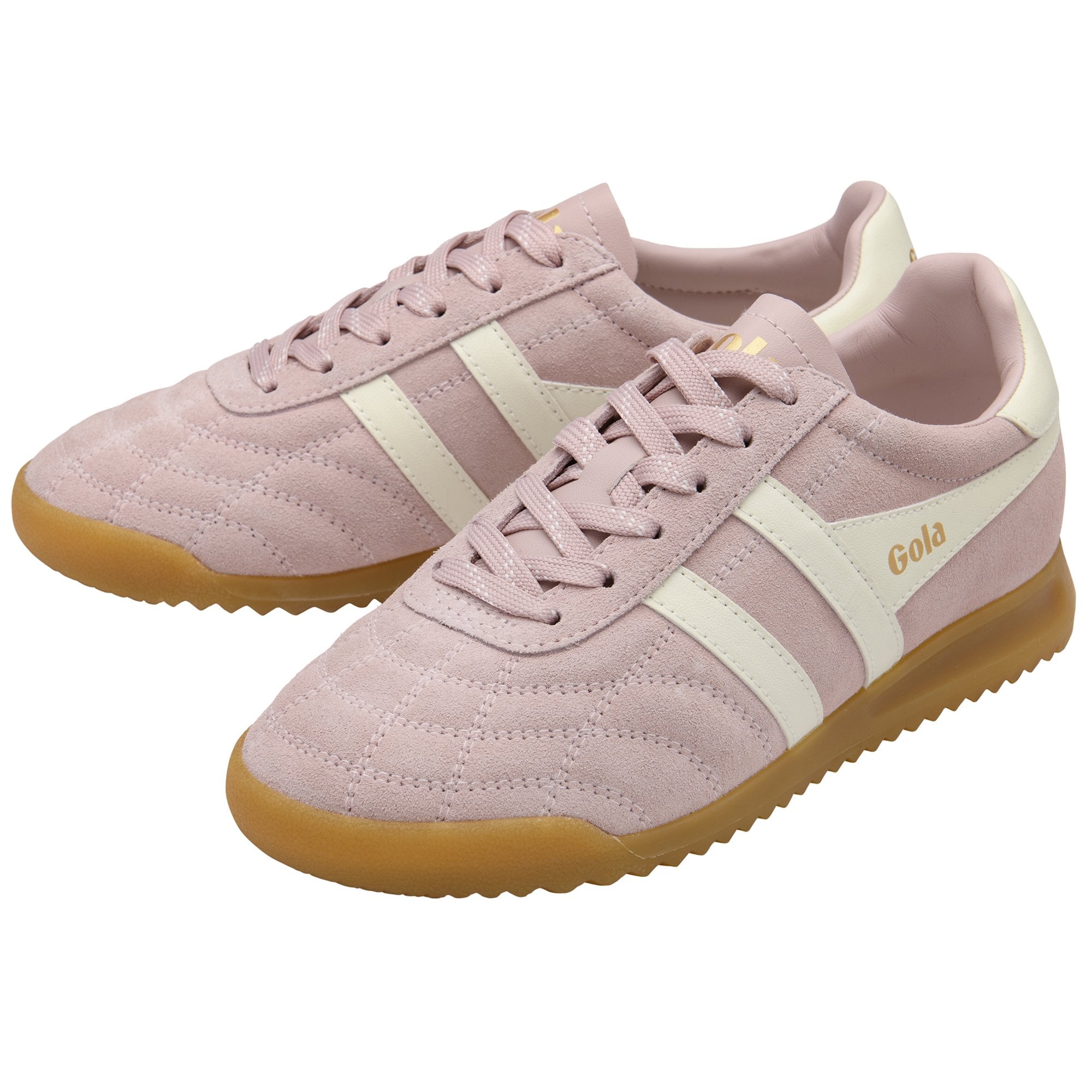 Pink suede sneakers with white stripes and brown soles.