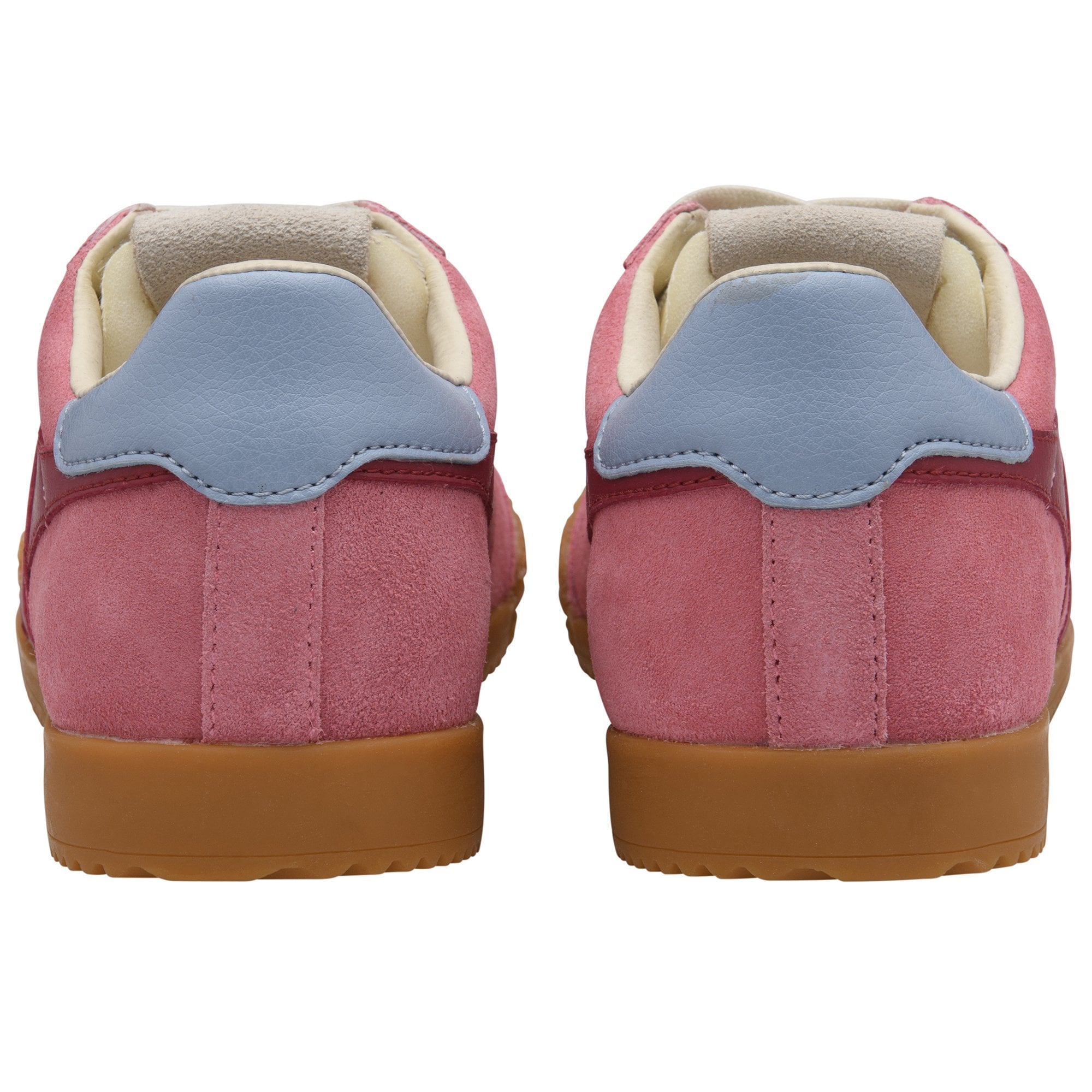 Rear view of two pink suede sneakers with light blue heel tabs and brown rubber soles.